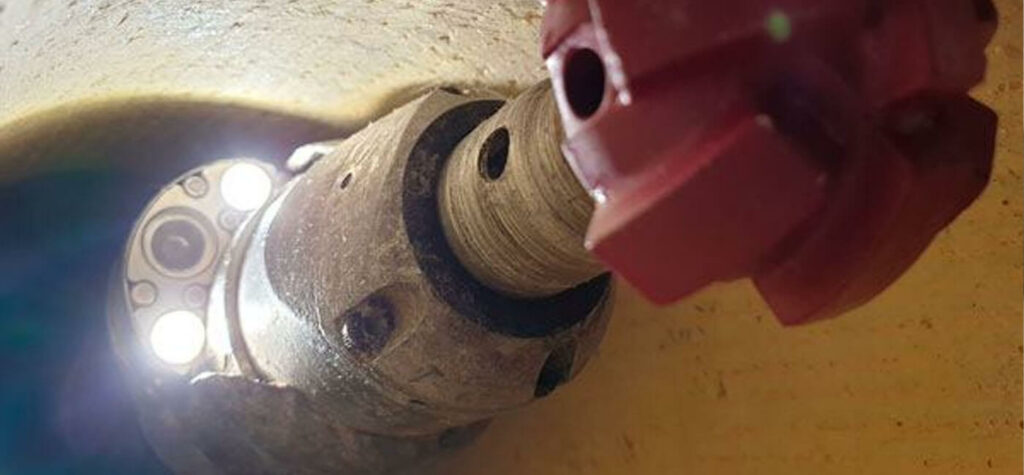 Robot fraiseur en action sur une canalisation d’assainissement dans les Yvelines.